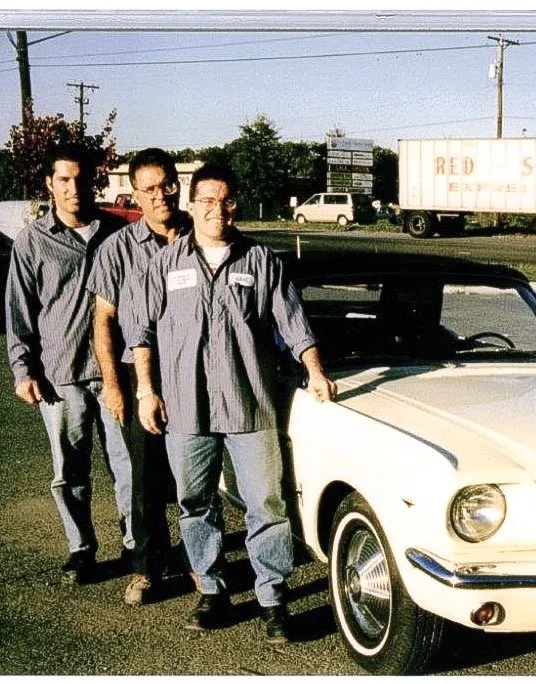 IMG_9748-69608553-1920w Three Zamora's Auto Body technicians beside a white classic Ford Mustang
